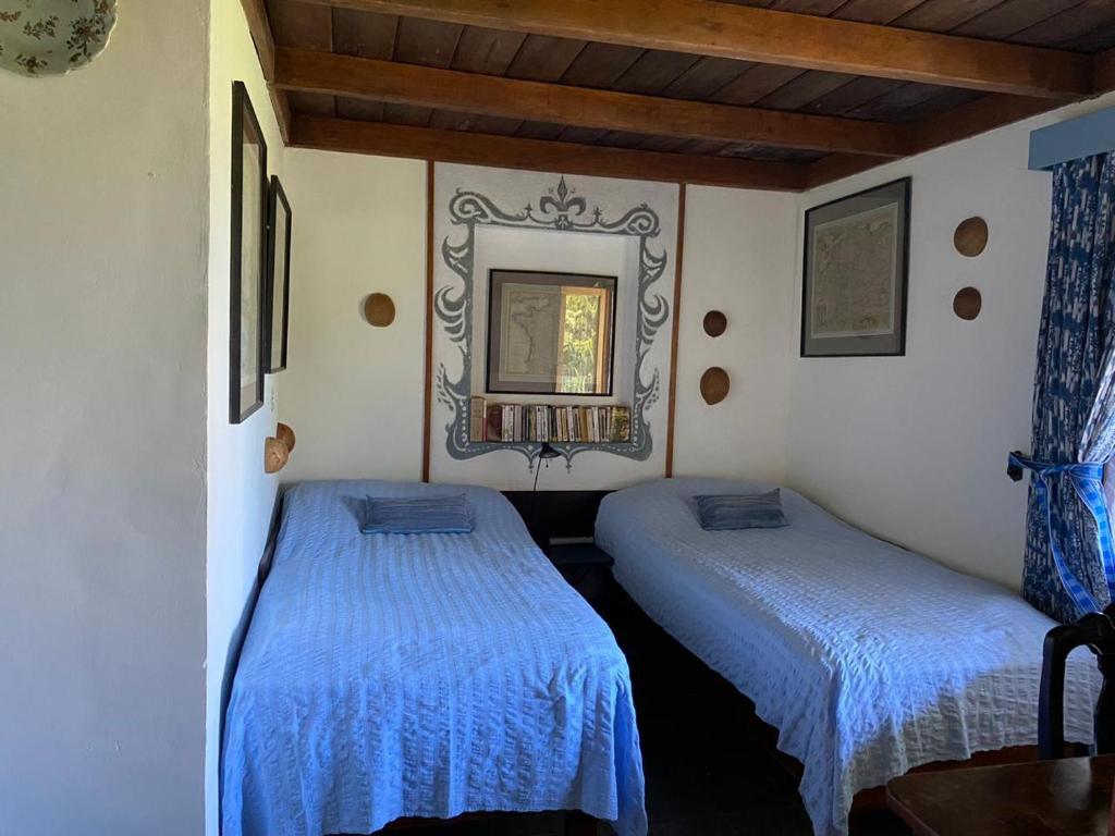 Postel nebo postele na pokoji v ubytování Hacienda Monteclaro