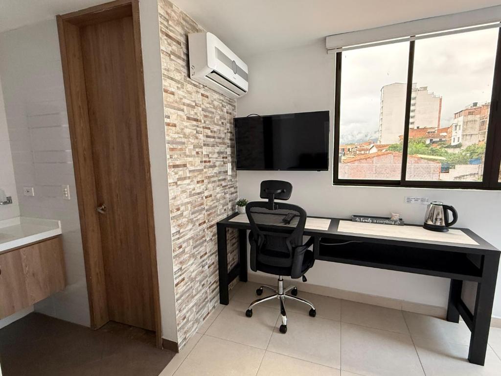 TV a/nebo společenská místnost v ubytování Aptahotel Guest House