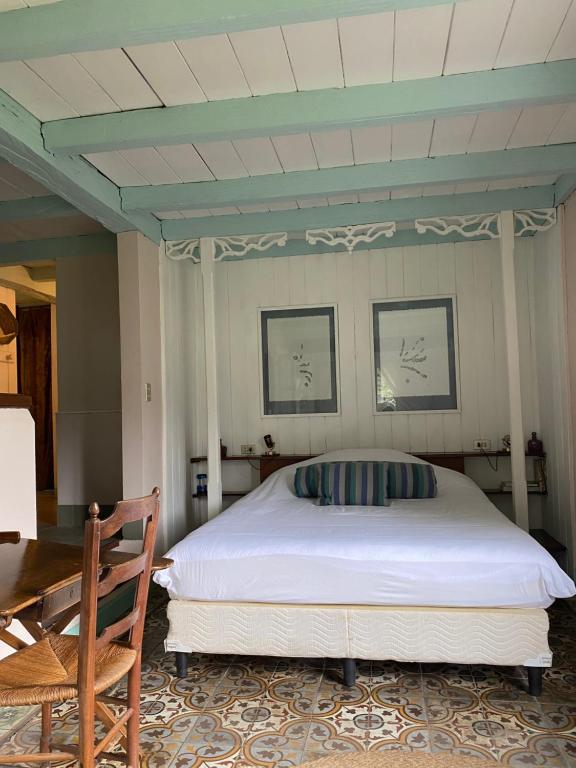 Postel nebo postele na pokoji v ubytování Hacienda Monteclaro