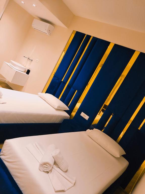 Postel nebo postele na pokoji v ubytování Almar Boutique Hotel