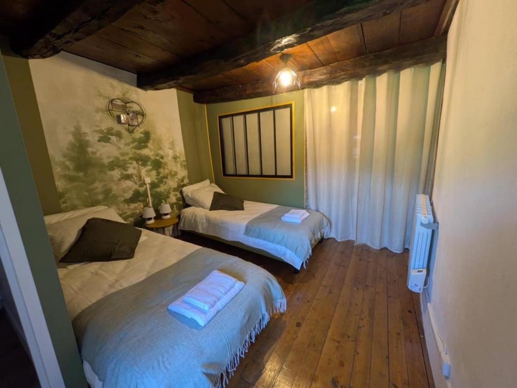 Un ou plusieurs lits dans un hébergement de l'établissement Sous les Etoiles du Bugey