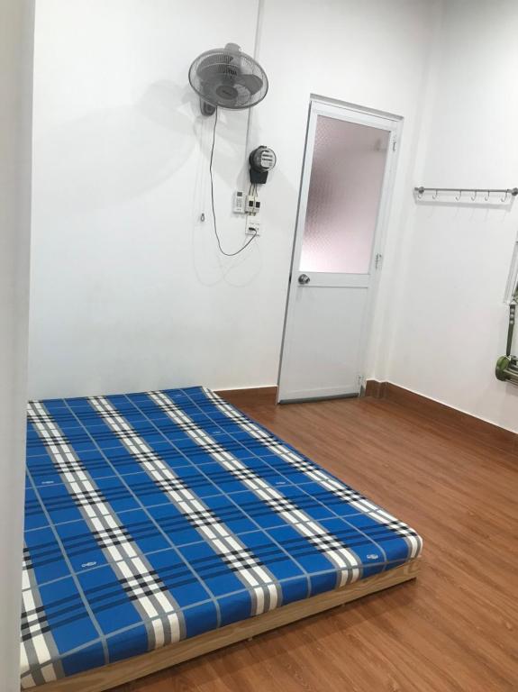 Postel nebo postele na pokoji v ubytování Minihouse Gia Phước