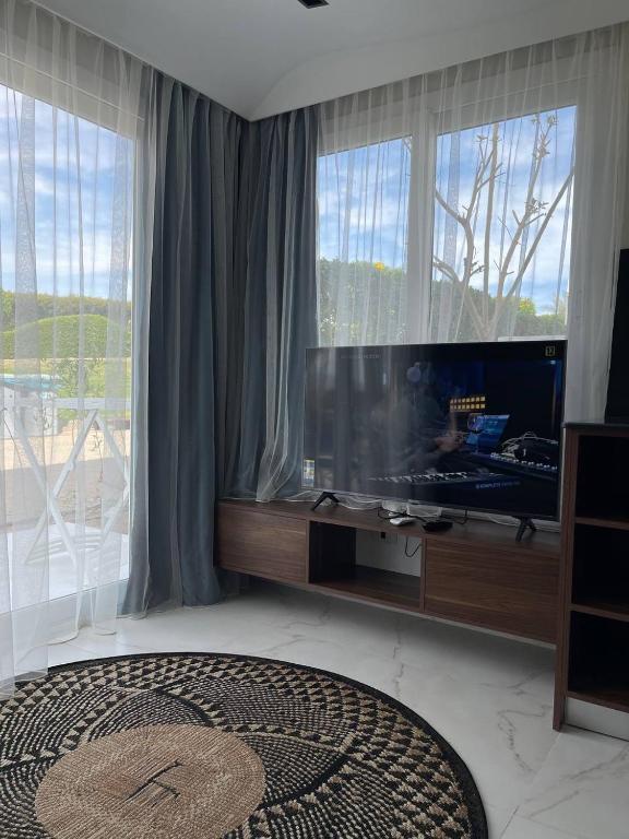 TV a/nebo společenská místnost v ubytování Jasmine Resort & Aqua park