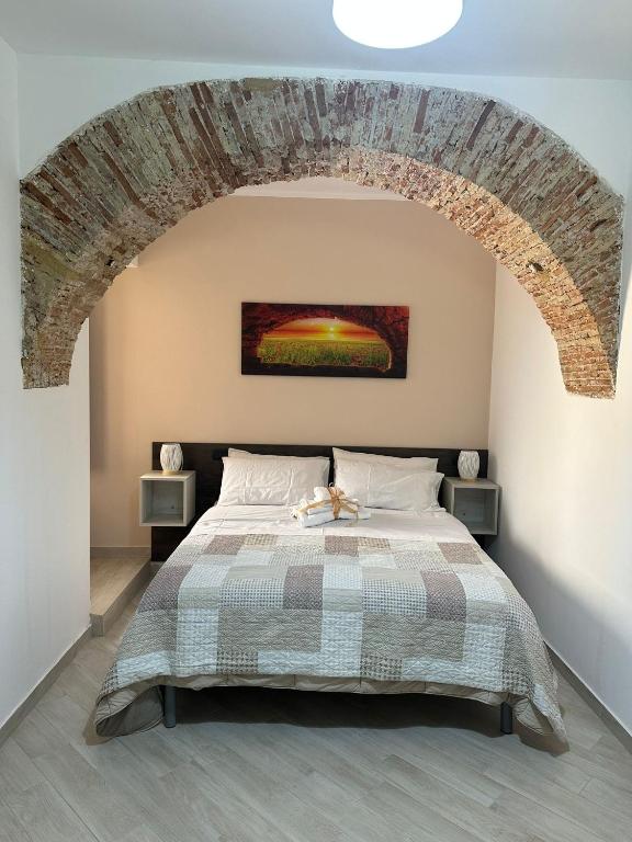 Postel nebo postele na pokoji v ubytování KALGHEROS Luxury Rooms