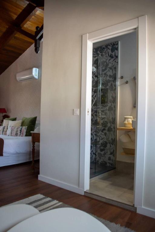Postel nebo postele na pokoji v ubytování CASA RURAL TRES VENTAS