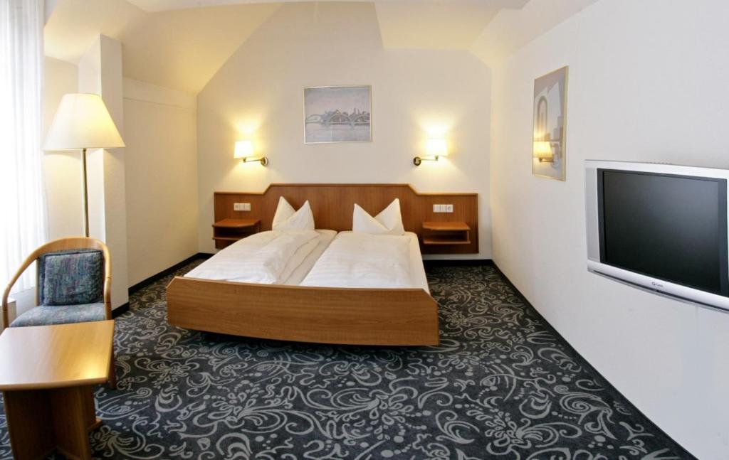 TV a/nebo společenská místnost v ubytování ALFA Hotel - Superior