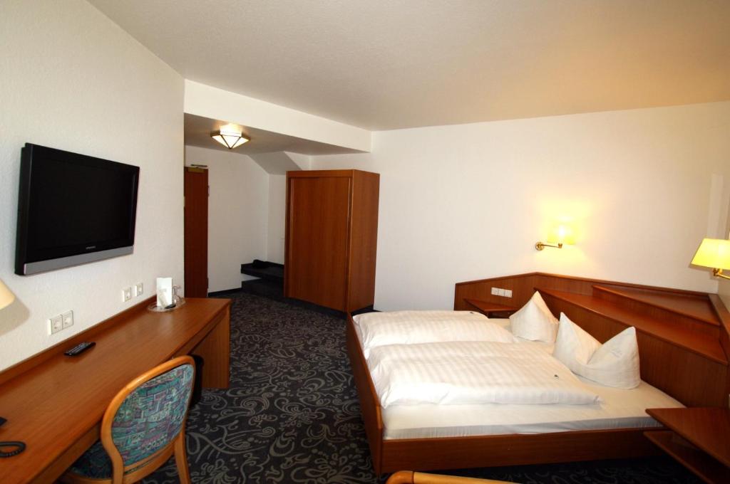 Postel nebo postele na pokoji v ubytování ALFA Hotel - Superior