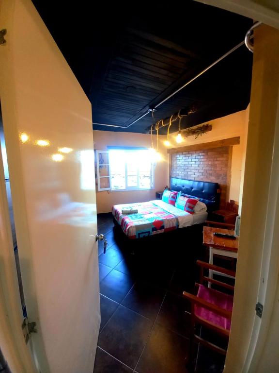Postel nebo postele na pokoji v ubytování Donde Pepe Loft Apartasuite.