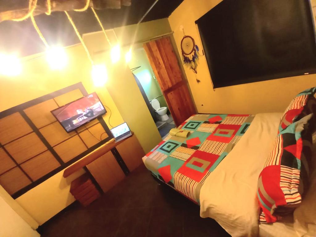 Postel nebo postele na pokoji v ubytování Donde Pepe Loft Apartasuite.