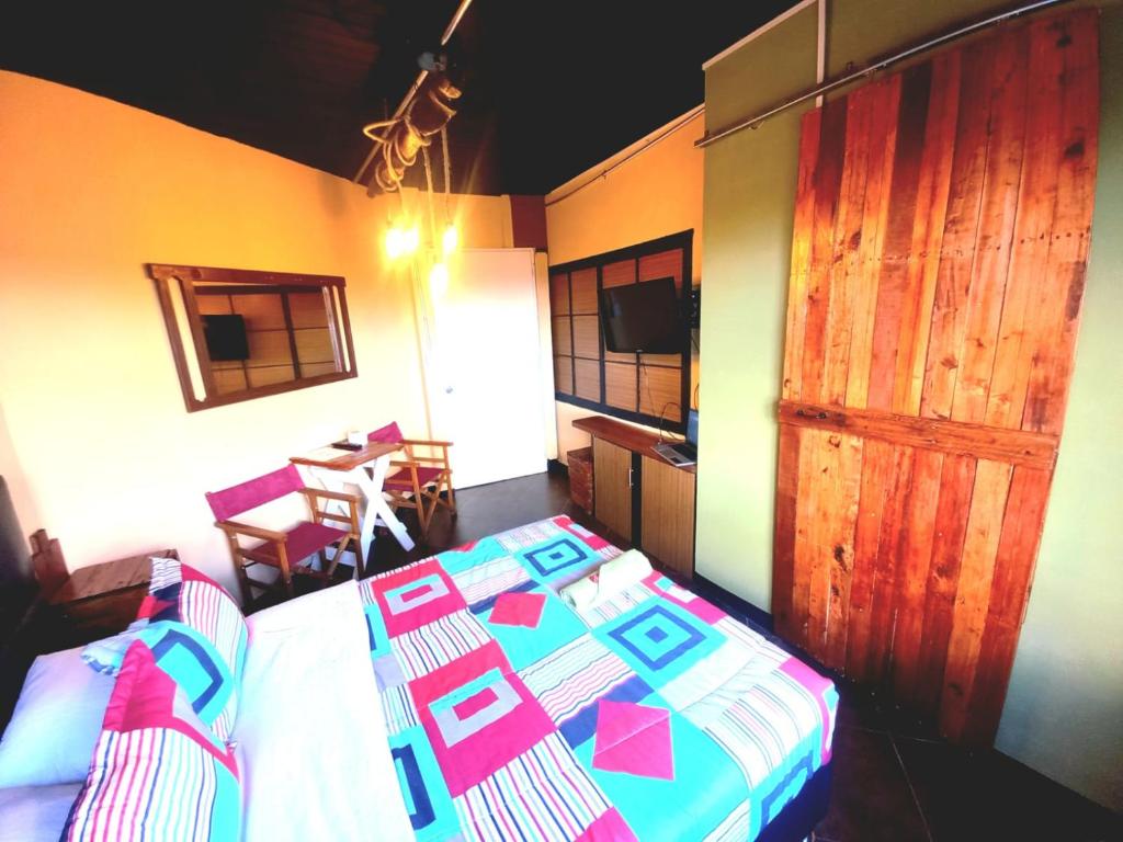 Postel nebo postele na pokoji v ubytování Donde Pepe Loft Apartasuite.