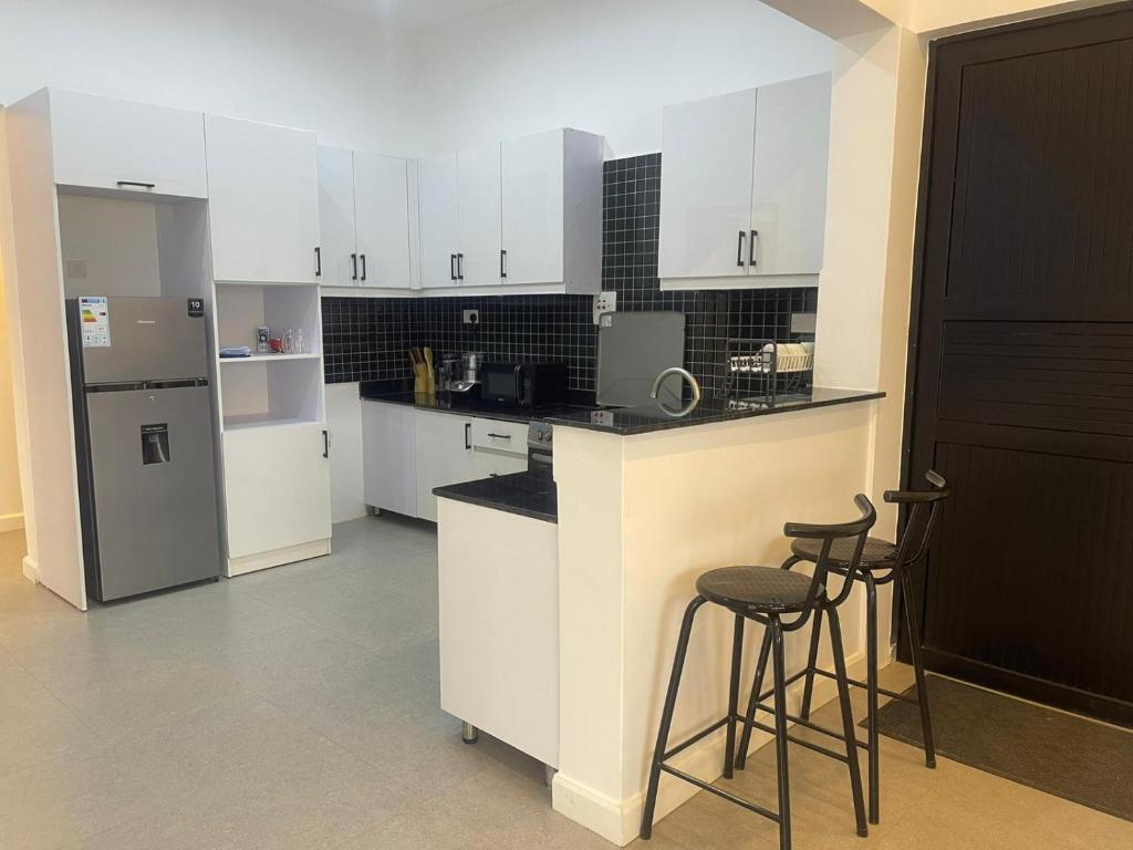 Kuchyň nebo kuchyňský kout v ubytování Bauhinia 21 Apartments