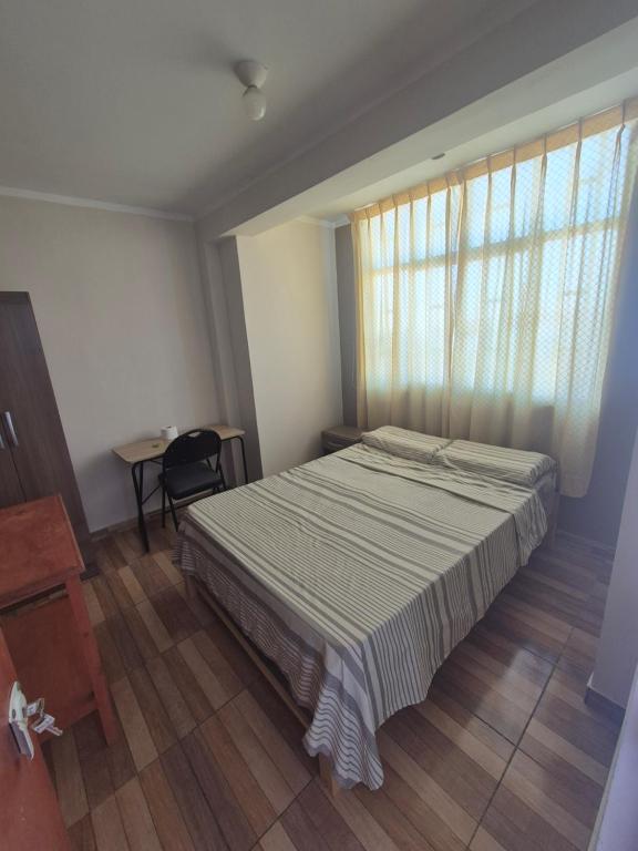 Postel nebo postele na pokoji v ubytování Habitación doble privada en Talara Centro