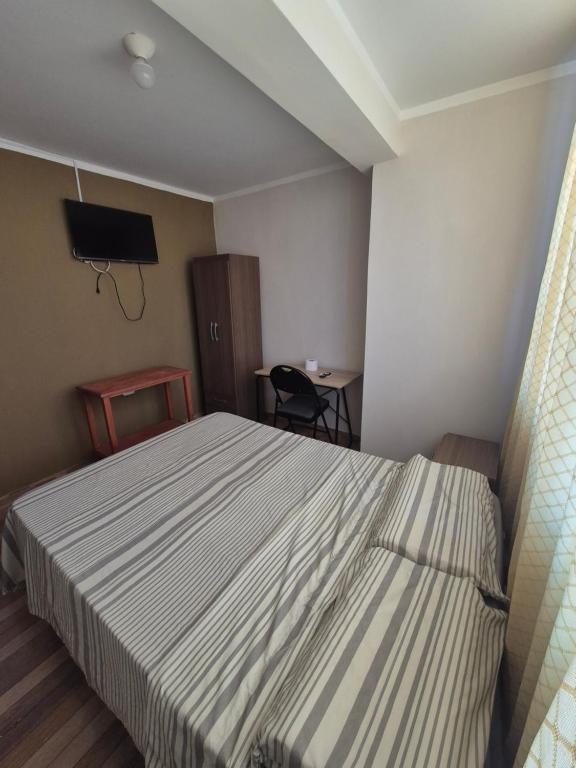 Postel nebo postele na pokoji v ubytování Habitación doble privada en Talara Centro