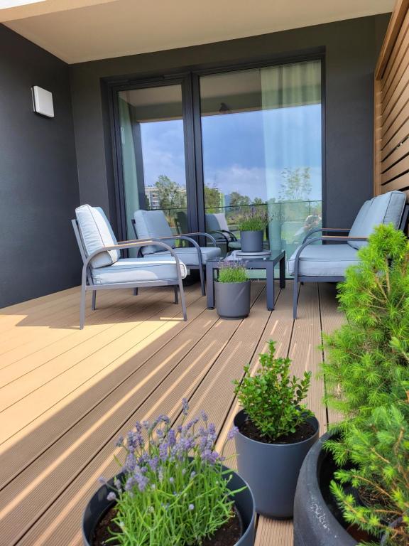 Vonkajšia záhrada v ubytovaní Apartament 150 Zaspa VVita