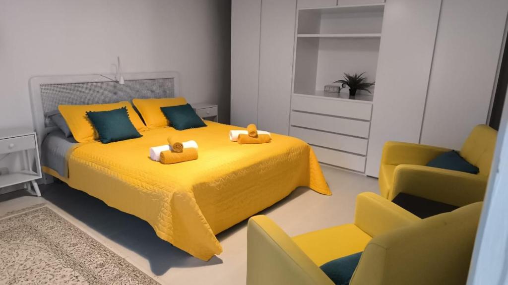 Postel nebo postele na pokoji v ubytování Casa Elena