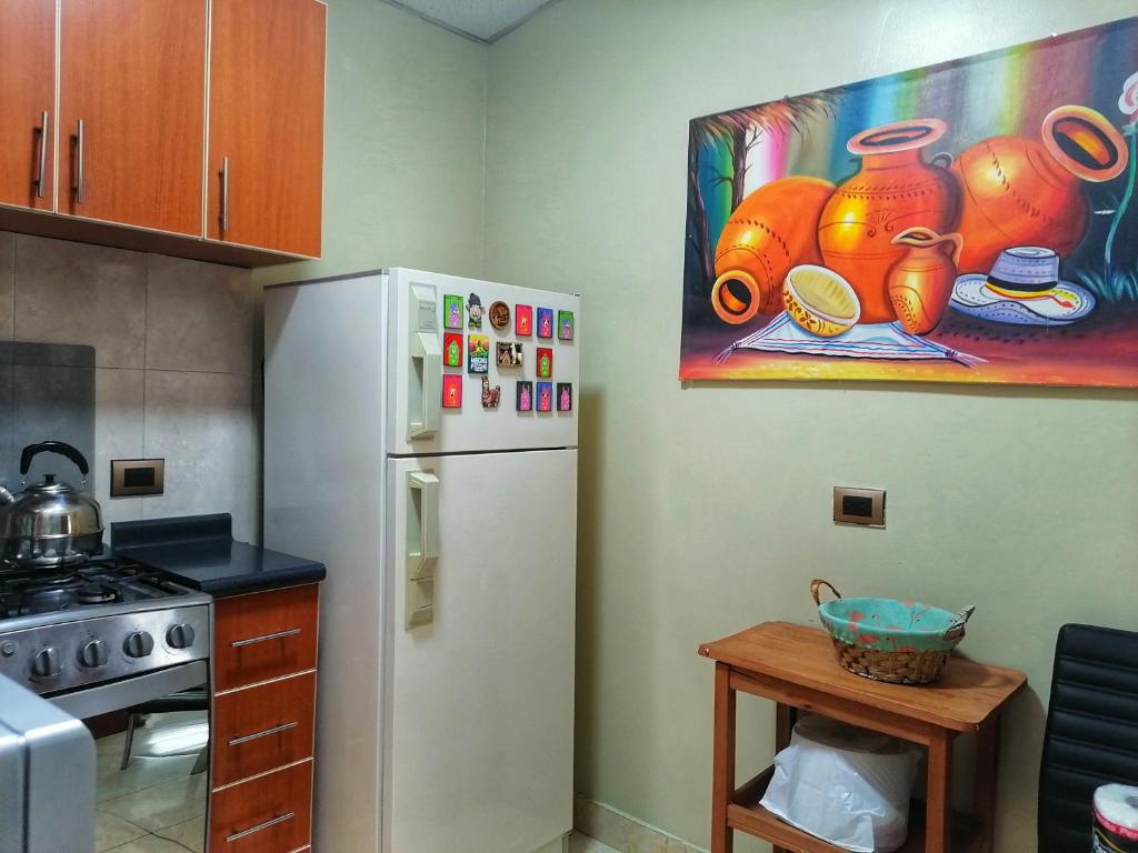 Kuchyň nebo kuchyňský kout v ubytování Sweet Home tu hogar en Cusco