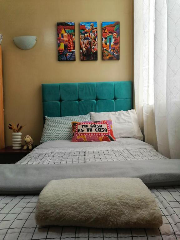 Postel nebo postele na pokoji v ubytování Sweet Home tu hogar en Cusco