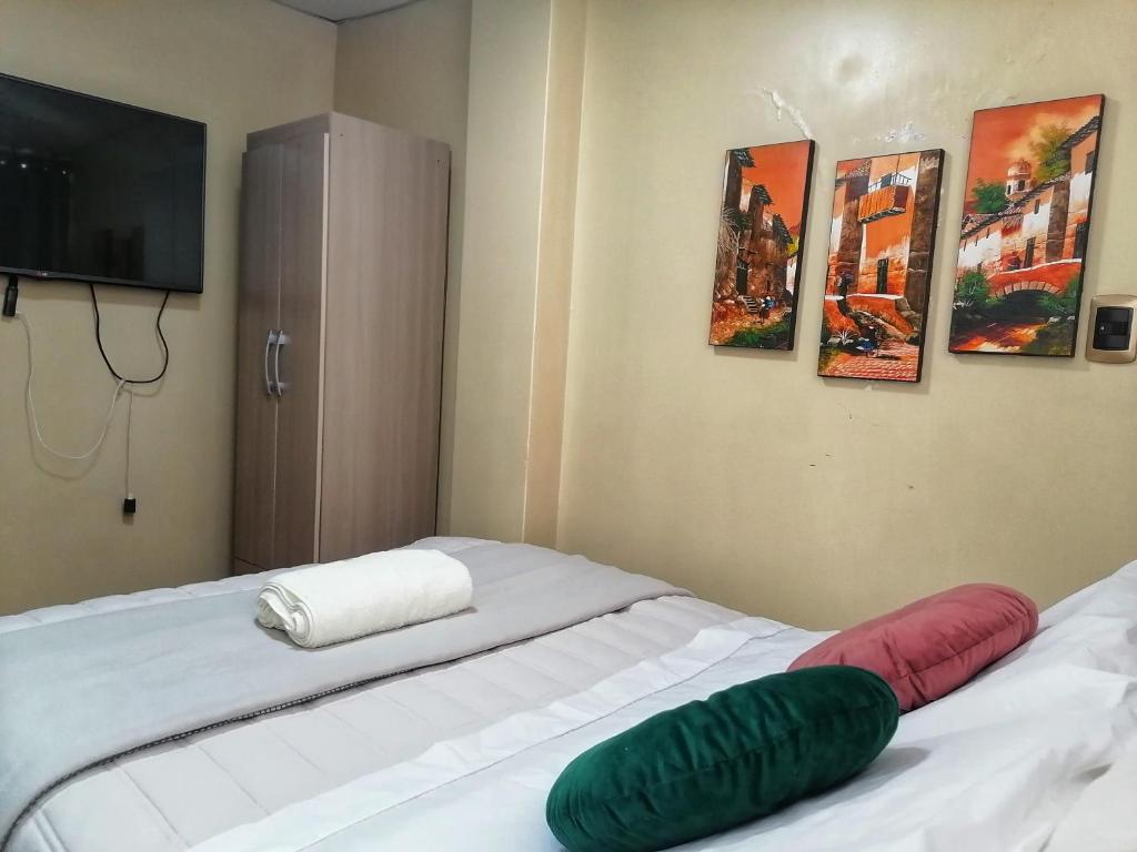 Postel nebo postele na pokoji v ubytování Sweet Home tu hogar en Cusco