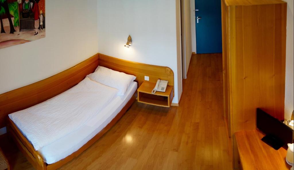 Postel nebo postele na pokoji v ubytování Hotel Victoria