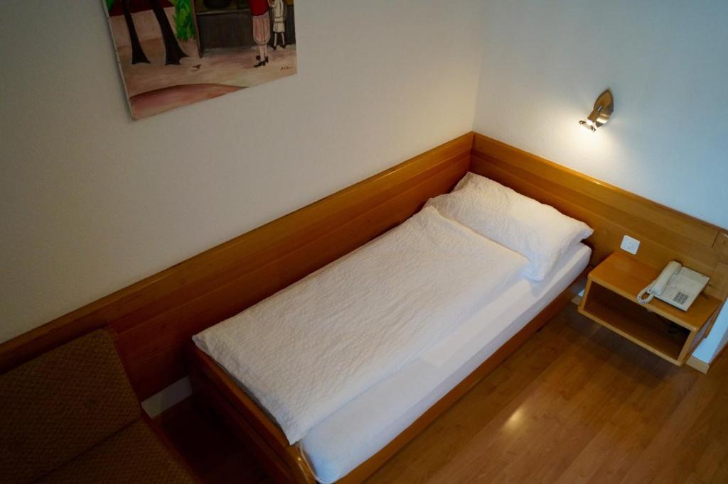 Postel nebo postele na pokoji v ubytování Hotel Victoria