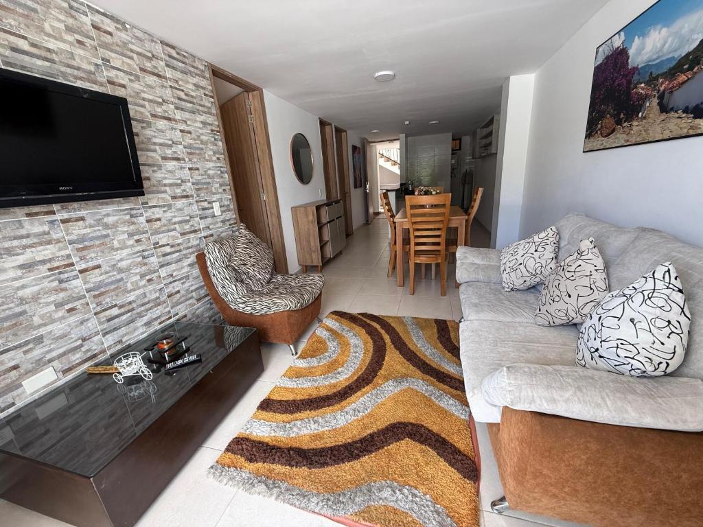 TV a/nebo společenská místnost v ubytování Aptahotel Guest House
