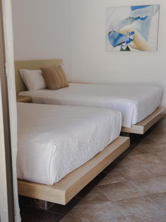 Postel nebo postele na pokoji v ubytování Hotel Los Patios