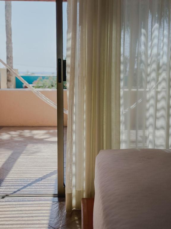 Postel nebo postele na pokoji v ubytování Hotel Los Patios