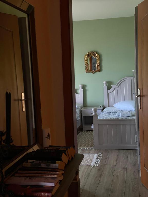 Postel nebo postele na pokoji v ubytování HOTEL VILA TOSKA