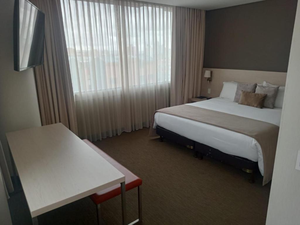 SHG Liv Zona G Hotelにあるベッド