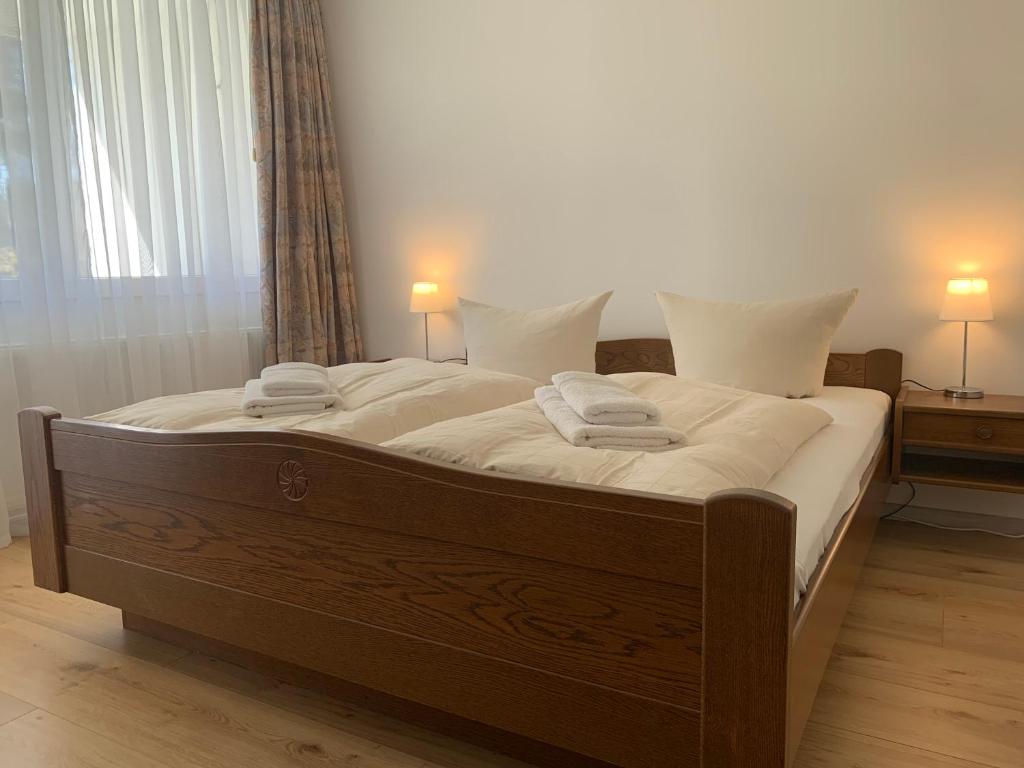 Postel nebo postele na pokoji v ubytování Hotel Haus Eggewald