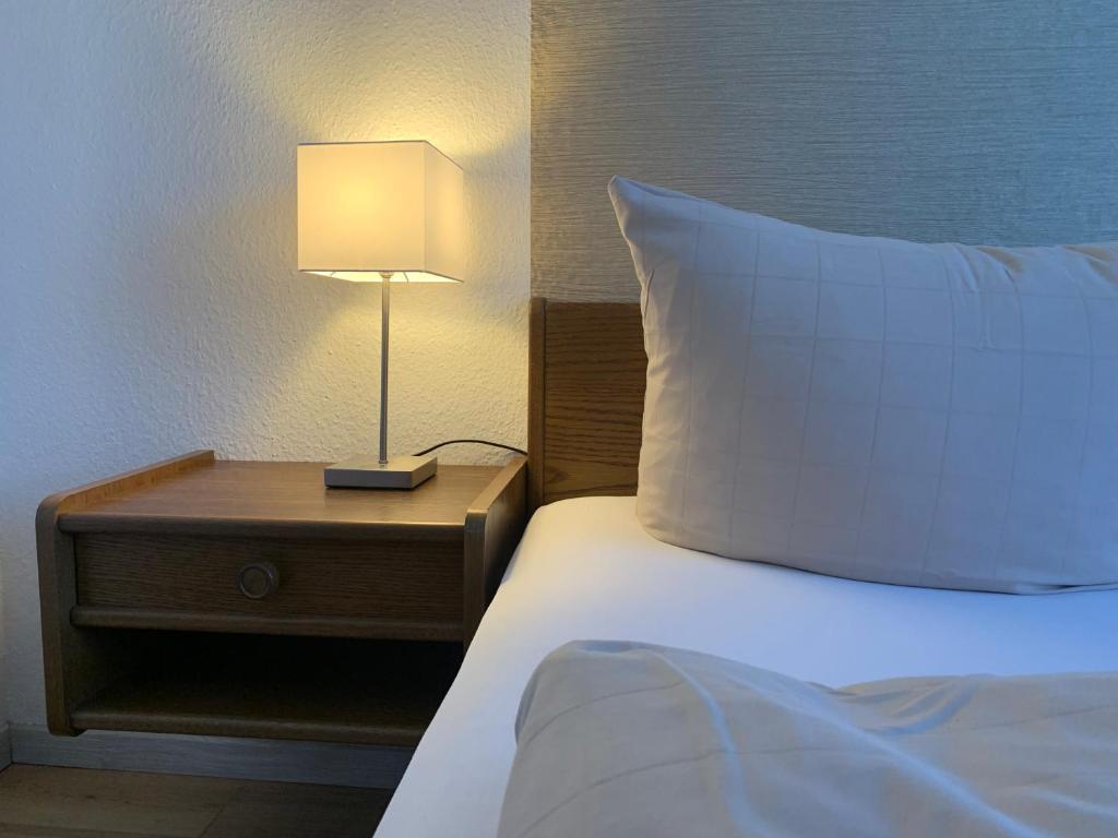 Postel nebo postele na pokoji v ubytování Hotel Haus Eggewald