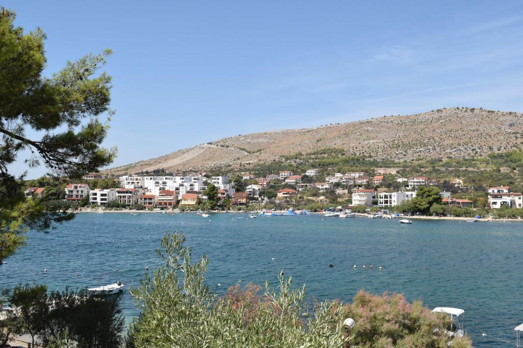 a view of a body of water with houses and buildings at Apartments Tonka Grebaštica in Grebaštica