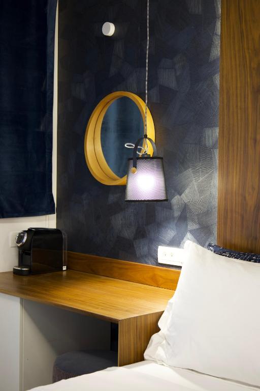 Postel nebo postele na pokoji v ubytování Hvar Riva Rooms