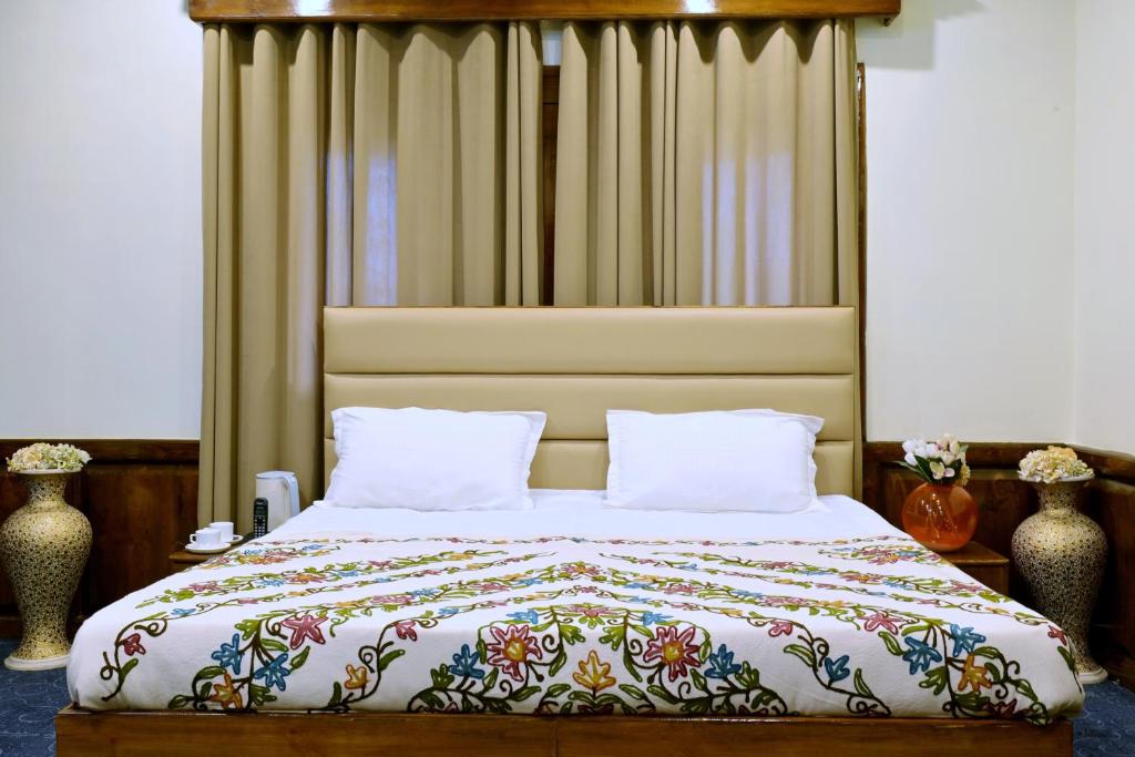 Postel nebo postele na pokoji v ubytování Taha Inn Home comfort