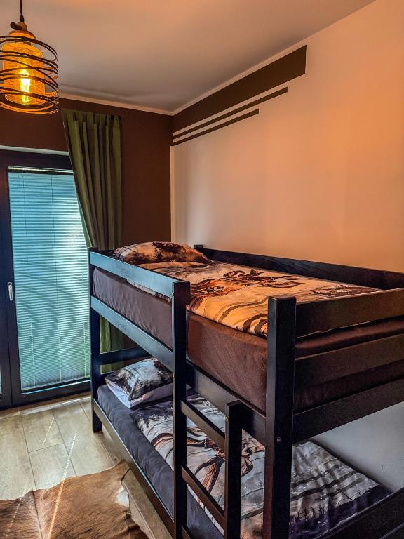 Postel nebo postele na pokoji v ubytování Vila Bašić Vlašić Spa Apartman JELEN