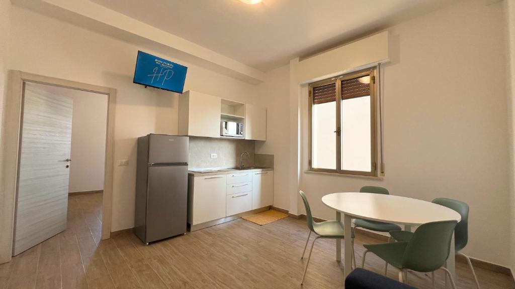 Kuchyň nebo kuchyňský kout v ubytování Hotel Patrizia - B&B e Appartamenti