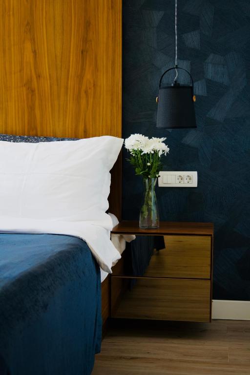 Postel nebo postele na pokoji v ubytování Hvar Riva Rooms