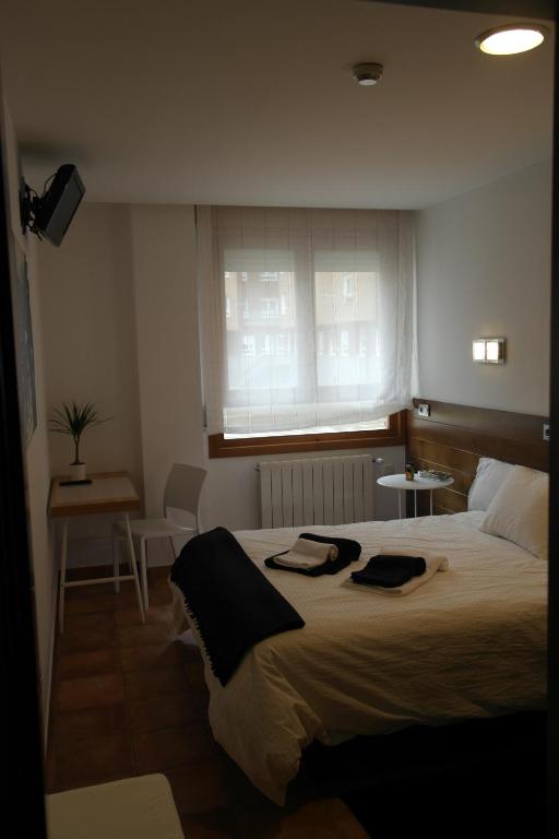 Posteľ alebo postele v izbe v ubytovaní Hotel Cuéntame