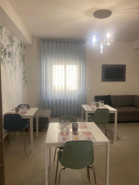 TV a/nebo společenská místnost v ubytování B&B Il Giardino Dei Templi