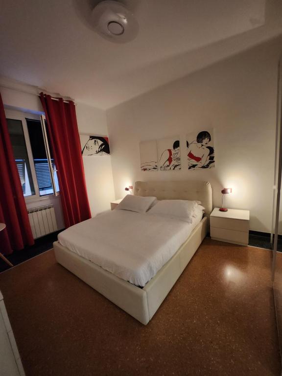 A bed or beds in a room at Varazzesuite apartment