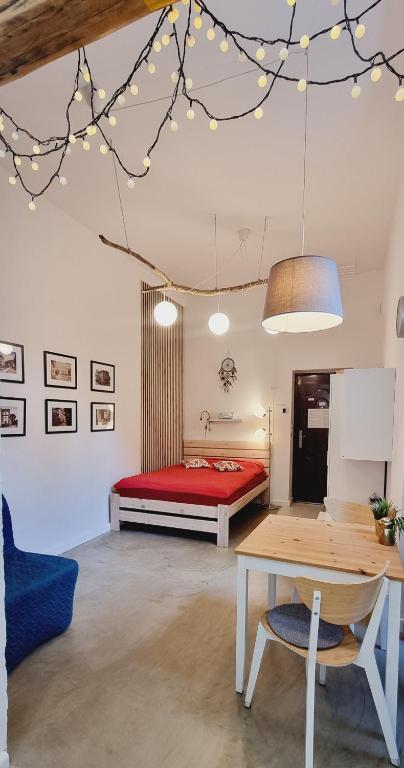 Posteľ alebo postele v izbe v ubytovaní Stara Poczta Apartament