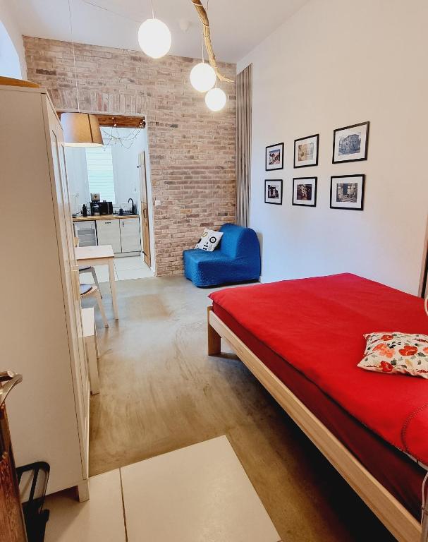 Posteľ alebo postele v izbe v ubytovaní Stara Poczta Apartament
