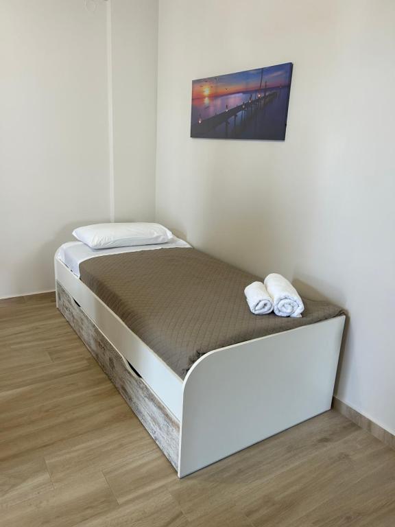 A bed or beds in a room at Sea Sparkle 1b