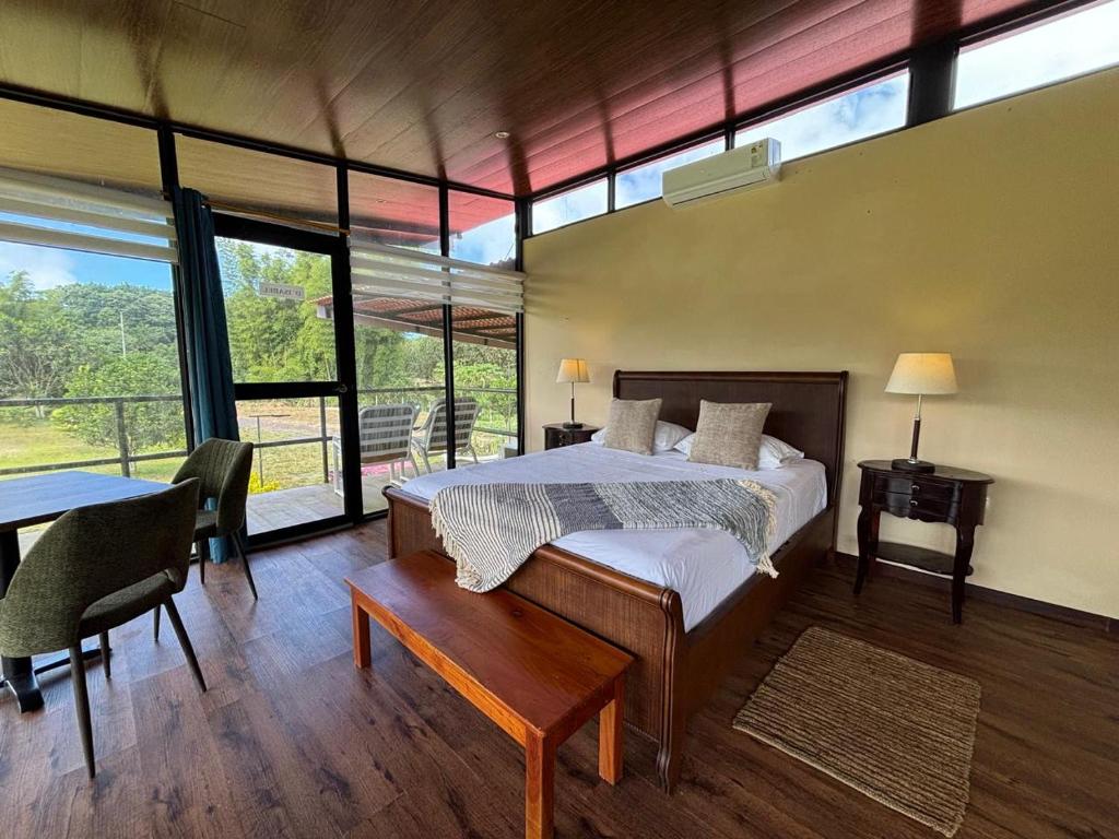 Postel nebo postele na pokoji v ubytování Quinta DCristhi Lodge