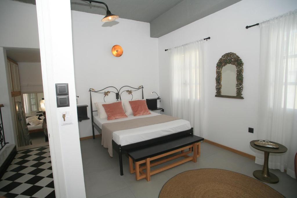 Letto o letti in una camera di Axilleion Boutique Hotel