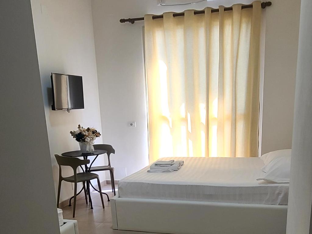 Letto o letti in una camera di Villa Arli&Eris