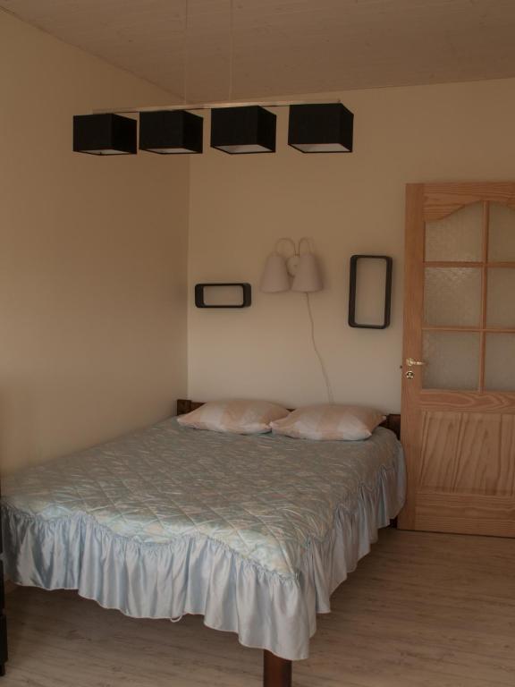 Postel nebo postele na pokoji v ubytování Mokko Lakehouse
