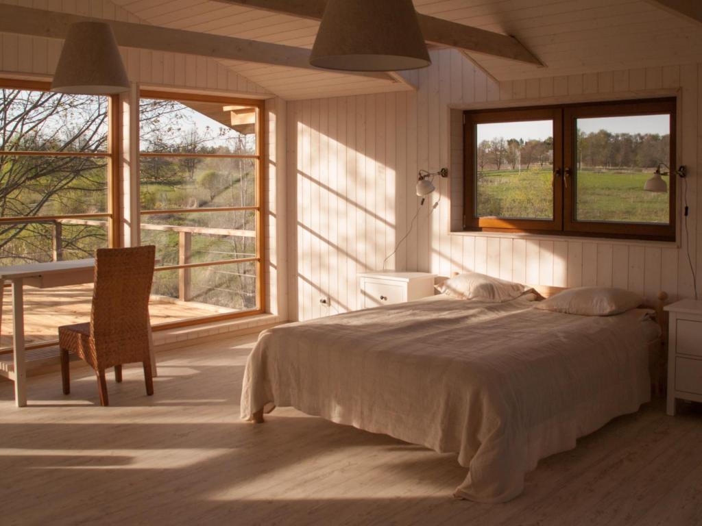Postel nebo postele na pokoji v ubytování Mokko Lakehouse