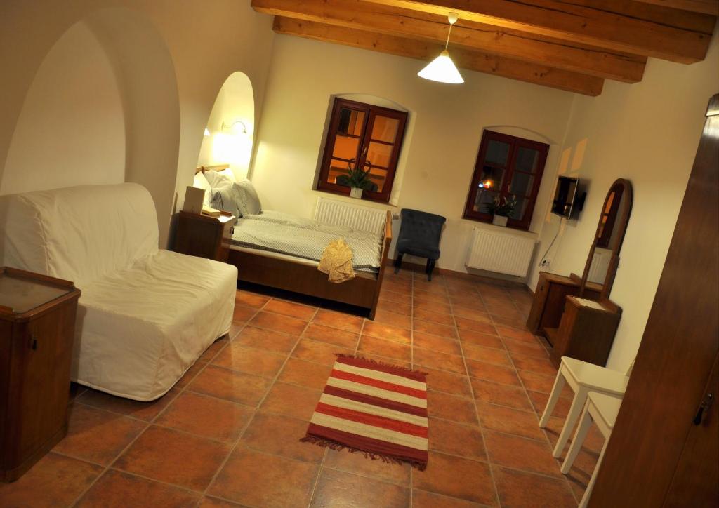 Postel nebo postele na pokoji v ubytování Apartmány U Vavřince