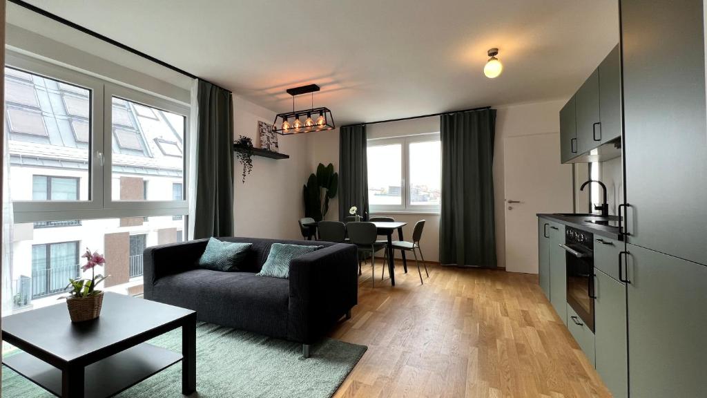 Et opholdsområde på Moderne OG Wohnung inklusive Dachterrasse